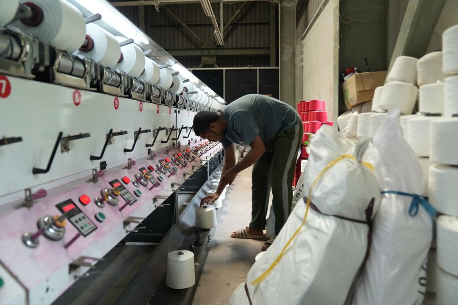 Yarn production machinery