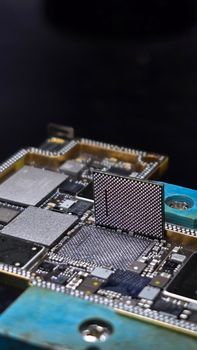 Detailed view of a high-tech electronic circuit with a microchip.
