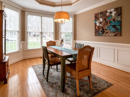 White crown molding along a ceiling and wall corner