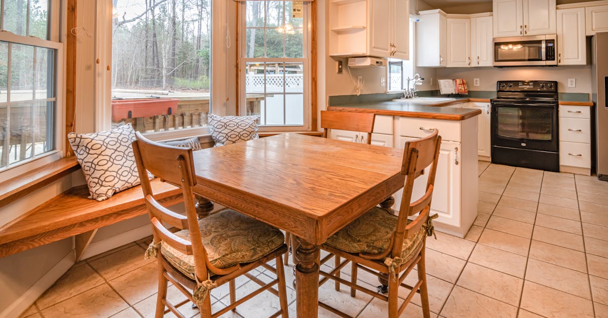 Photo Of Wooden Table Near Window ยท Free Stock Photo