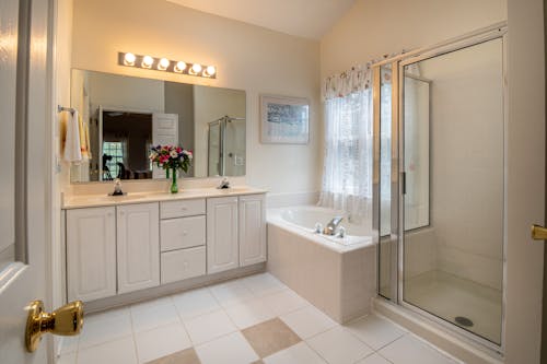 Photo Of Ceramic Sink Near Bathtub