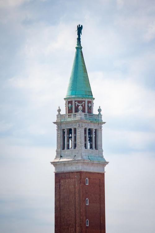 Free Close-up of Campanile di San Marco against a cloudy sky, Venice. Stock Photo