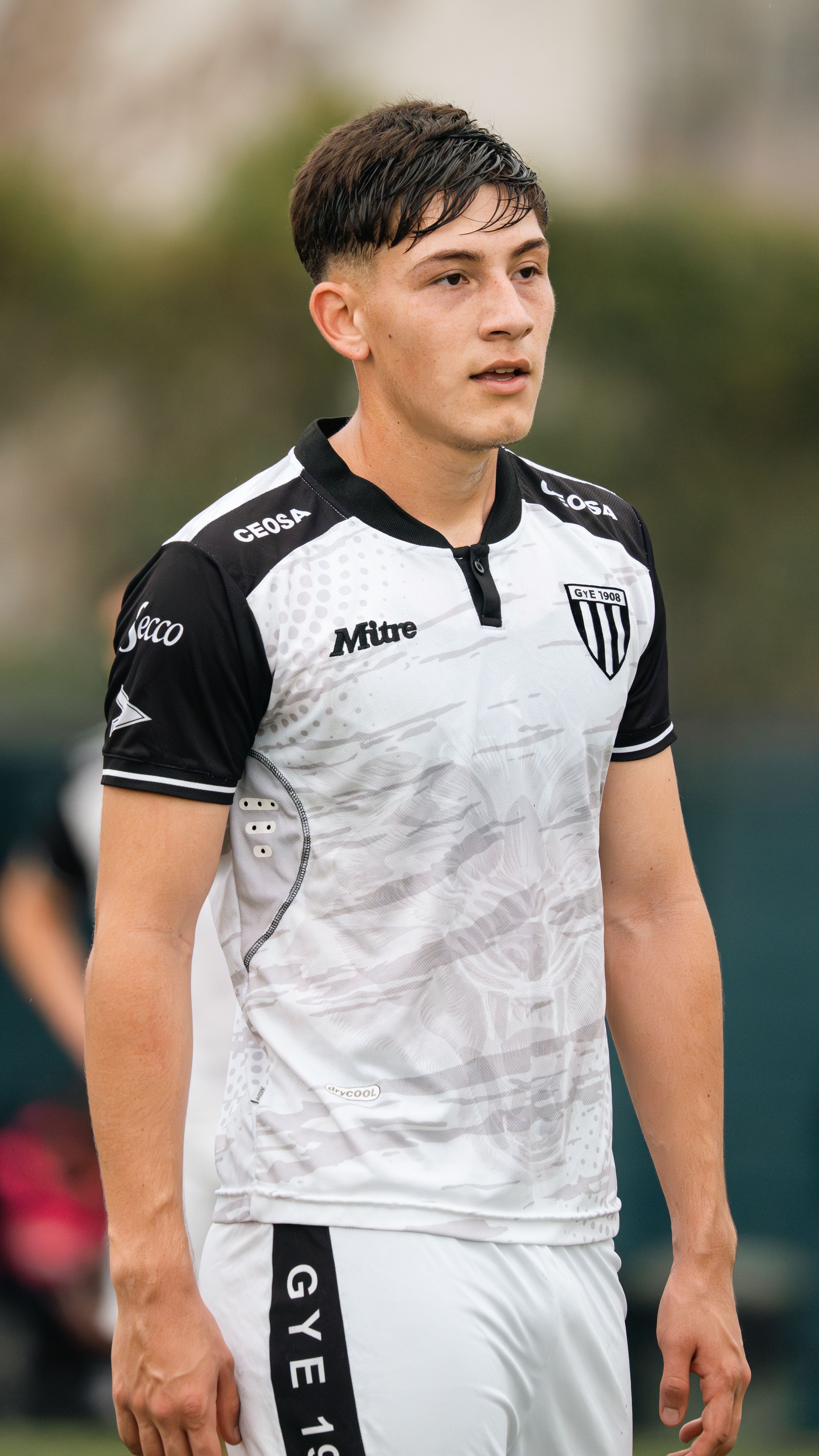 Portrait of a young soccer player during a match.