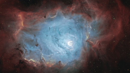Free Explore the captivating Lagoon Nebula (M8) in vivid colors, capturing the wonders of the universe. Stock Photo