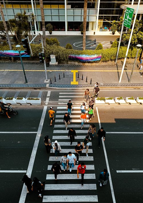 Free Aerial view of people crossing street in Jakarta, Indonesia, during daytime. Stock Photo