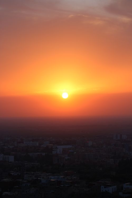 Free Captivating sunset view over Béni Mellal cityscape, Morocco, casting warm hues across the sky. Stock Photo