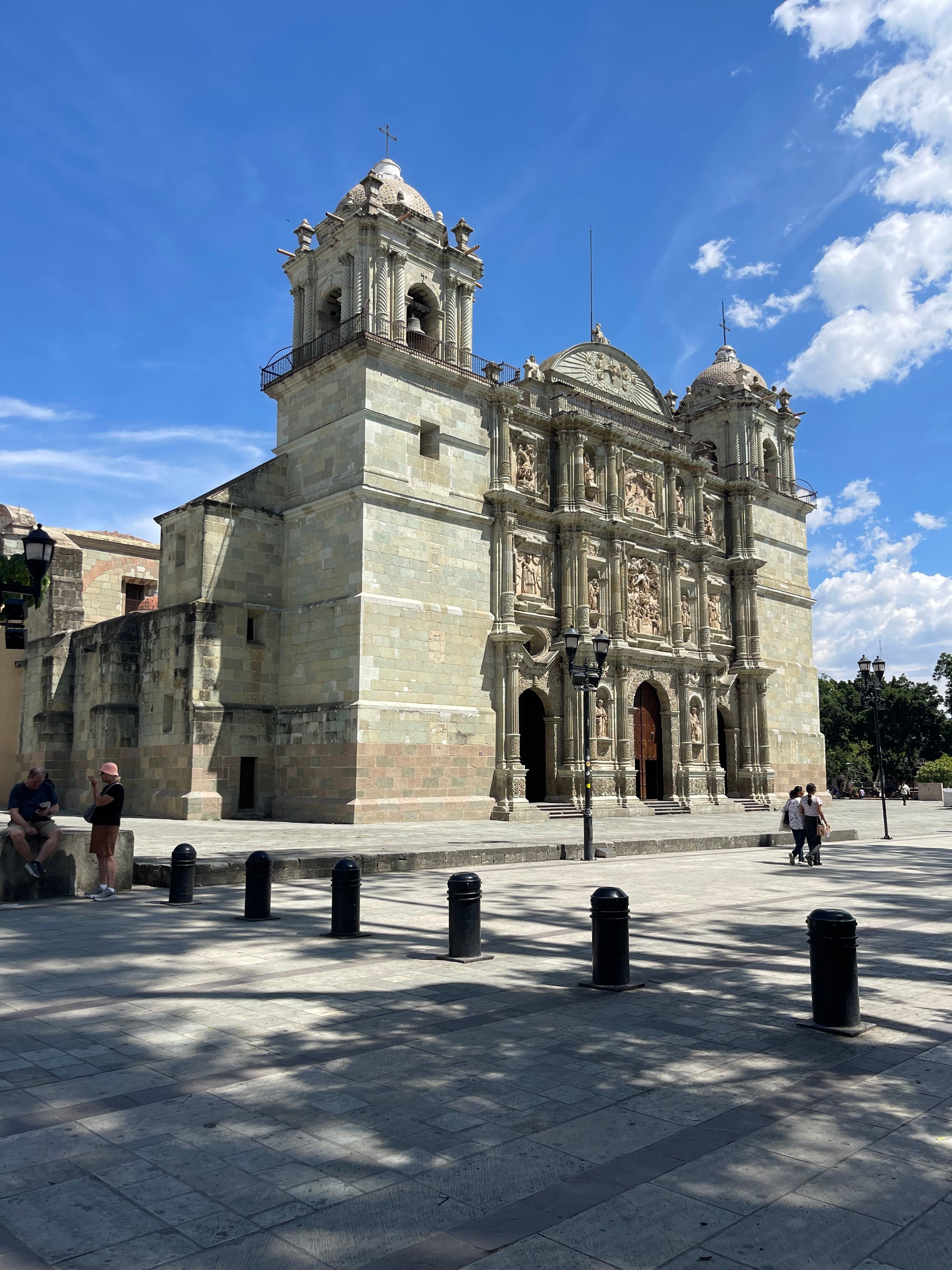 Capture of the historic Santo Domingo de Guzman Church showcasing its stunning Baroque architecture in Oaxaca, Mexico.
