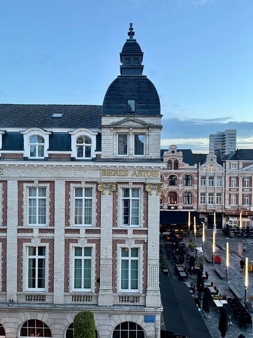 Free Early morning view of historic architecture in Leuven, Belgium, showcasing elegant facades and urban scenery. Stock Photo