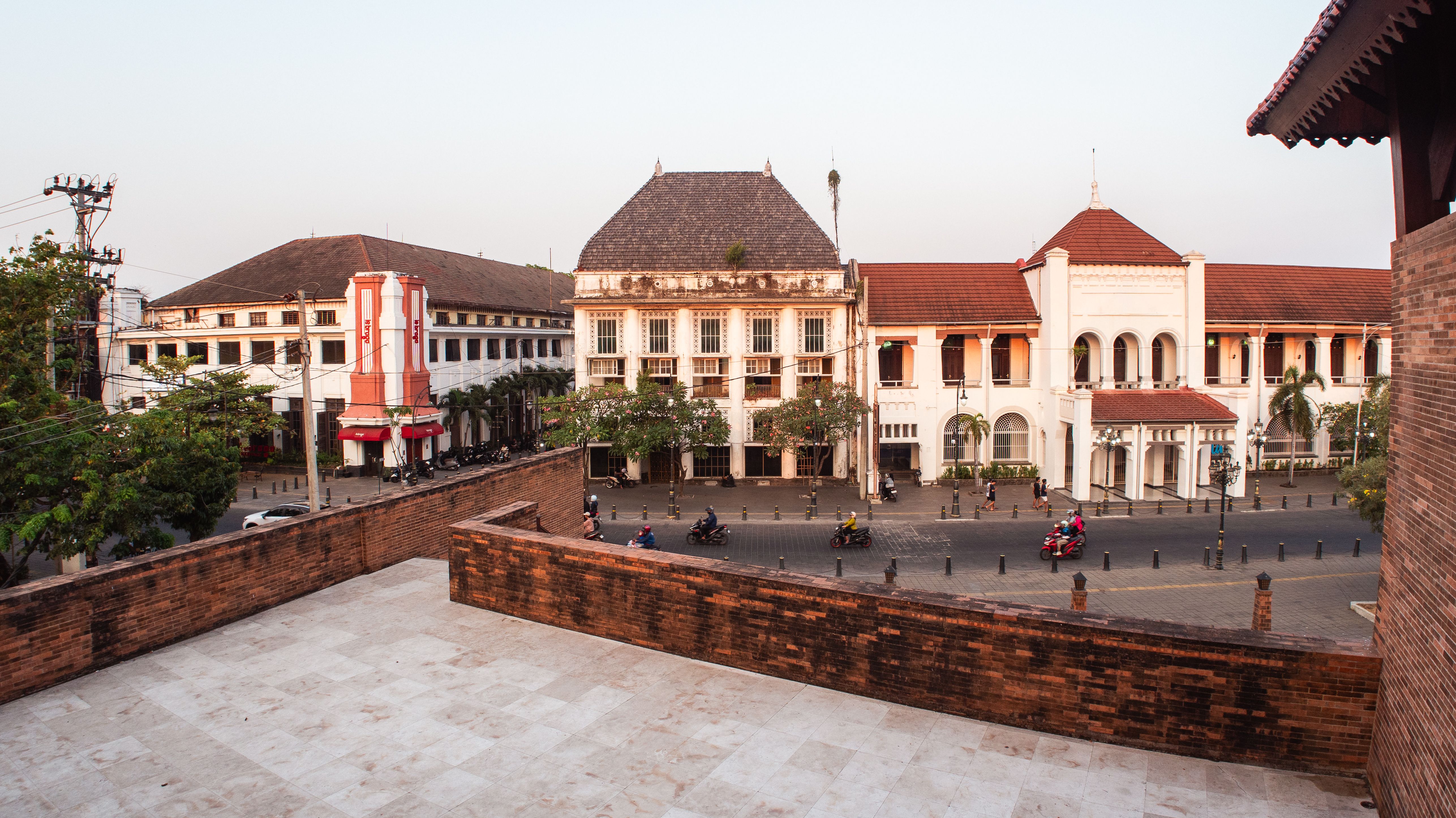 Historic buildings at sunset in Semarang Old Town with vibrant colonial architecture.