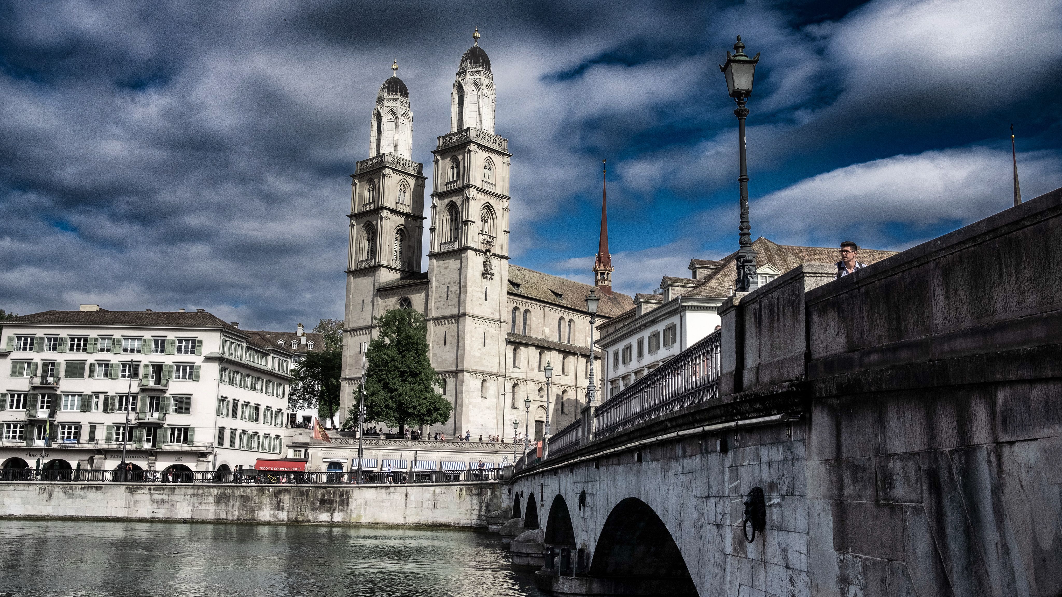 View of the iconic Grossmünster Cathedral in Zurich with picturesque architecture.