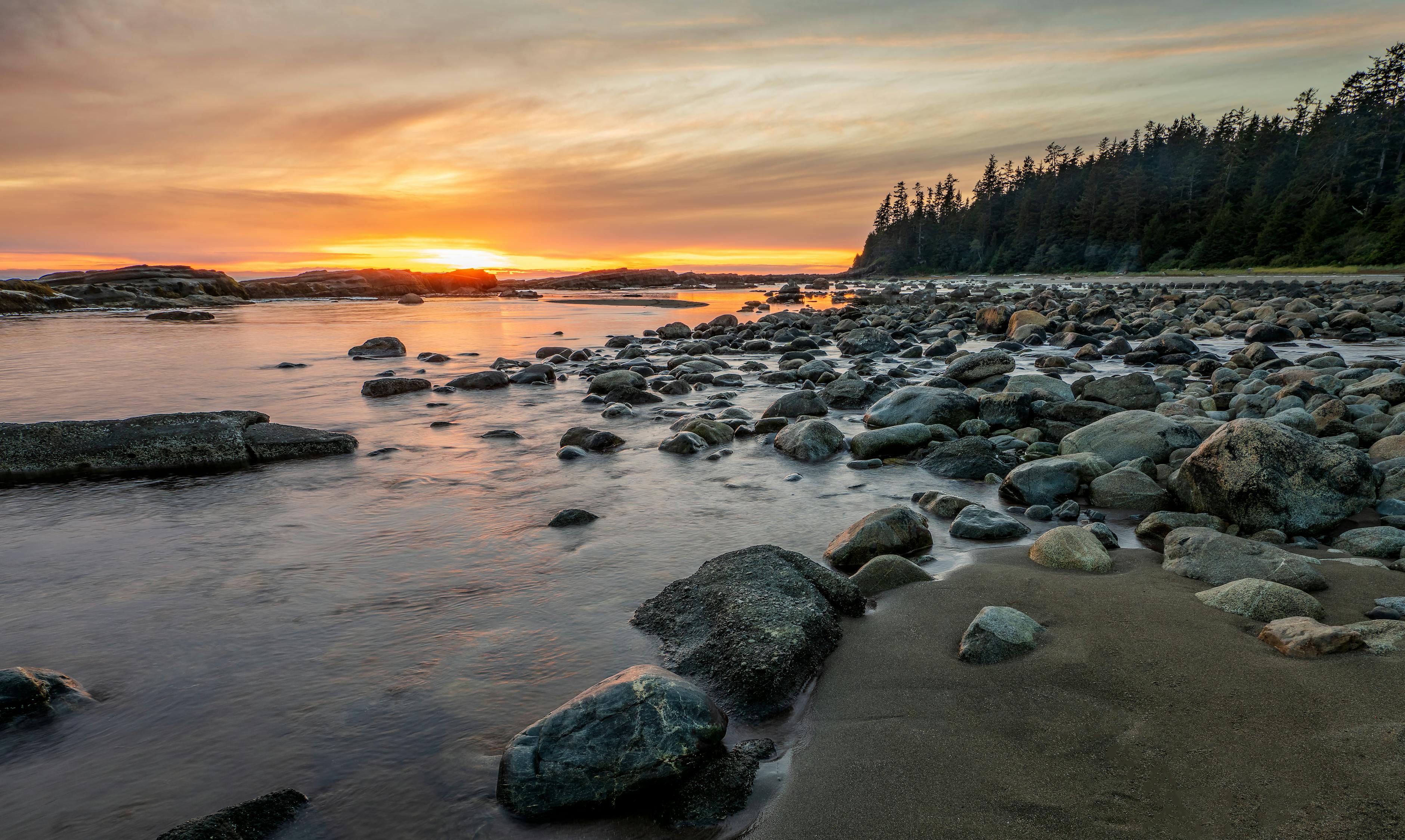 Rocky Shore With Rocks On The Shore During Sunset · Free Stock Photo