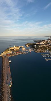 Stunning aerial view of Şile harbor with its iconic lighthouse on the Black Sea coast of İstanbul, Türkiye.