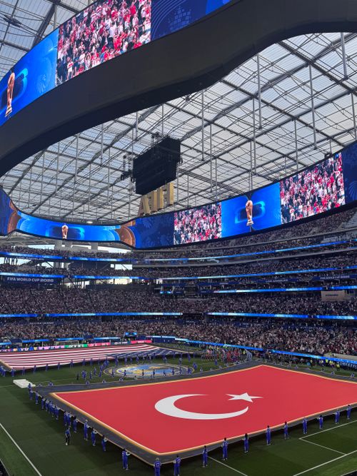 Free Huge international soccer event with a vibrant crowd and Turkish flag display. Stock Photo