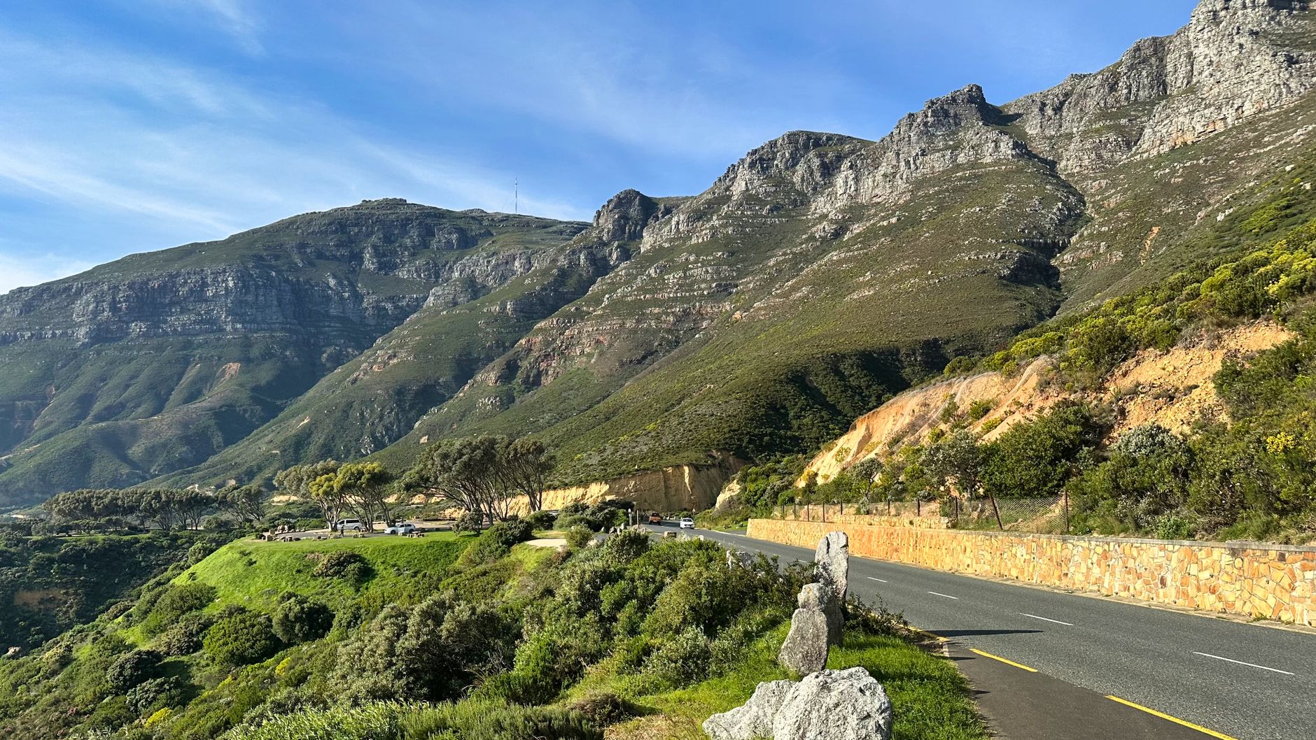 Breathtaking view of Chapman's Peak Drive and Table Mountain in Cape Town.