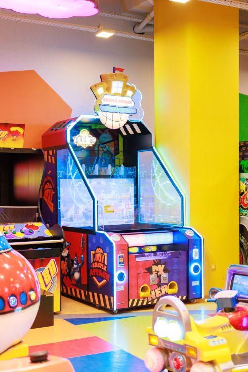 Free Colorful arcade game setup with various machines in a fun center in Ünye, Türkiye. Stock Photo