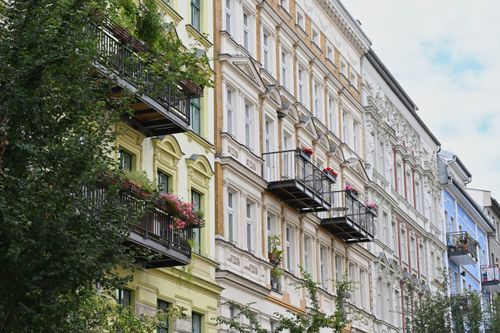 Free Explore the ornate architecture and vibrant facades of historic tenement houses in Berlin, Germany. Stock Photo