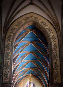 Stunning ornate ceiling with intricate designs in a cathedral in Cracovia, Poland.