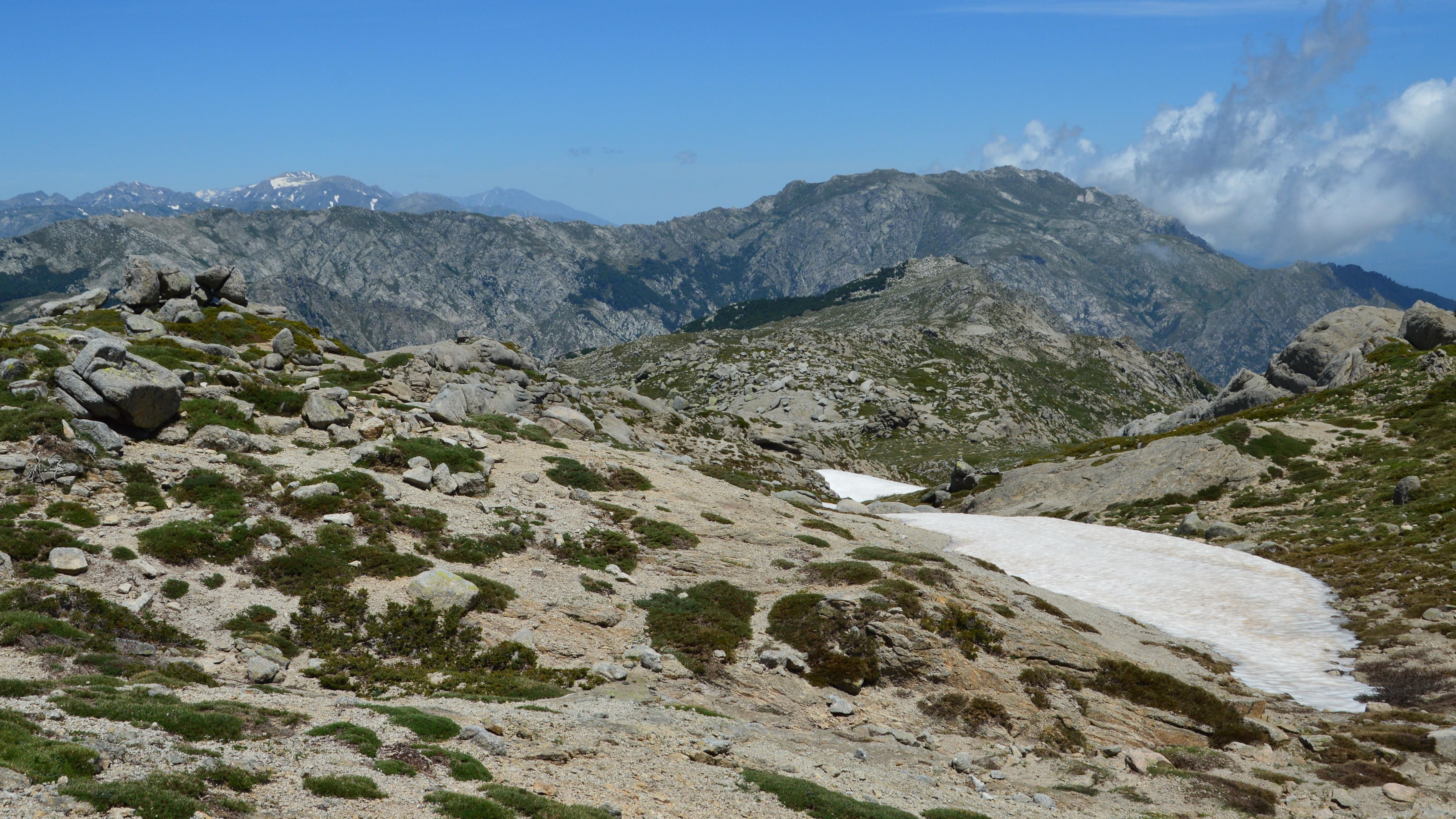 Stunning view of the rugged mountains and alpine terrain in Aullène, Corsica, France.