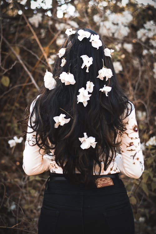 Photo of Woman With Flowers On Her Hair