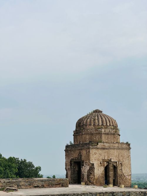 Free Explore the historic stone structure under clear skies in Punjab, Pakistan. Stock Photo