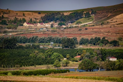 Beautiful rural landscape in Manzini, Eswatini featuring rolling hills and lush greenery.