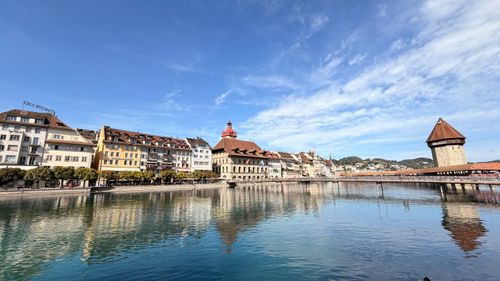 Free Scenic view of Chapel Bridge and Reuss River in Luzern on a sunny day. Stock Photo