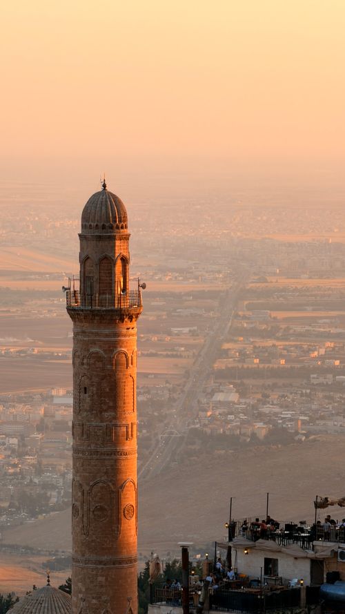 Free Stunning sunset view of the Great Mosque in Mardin, Türkiye with a panoramic cityscape. Stock Photo