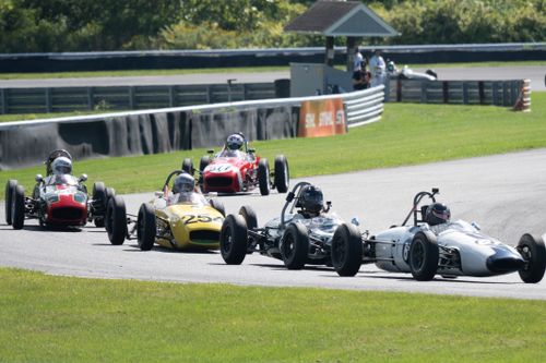 Free Vintage sports cars compete at a race track in Salisbury, Connecticut. Stock Photo