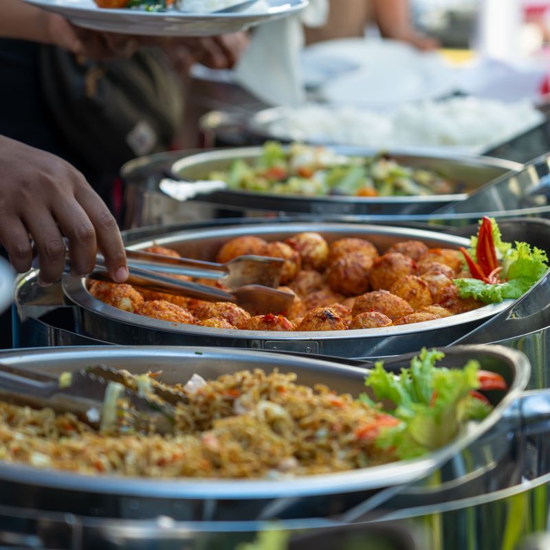 Outdoor buffet with steel serving dishes