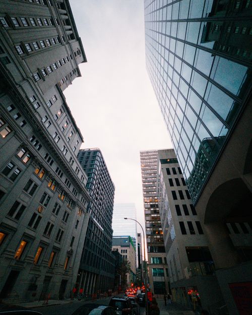 Free Dynamic view of Montreal's urban skyline with modern and historic architecture at twilight. Stock Photo