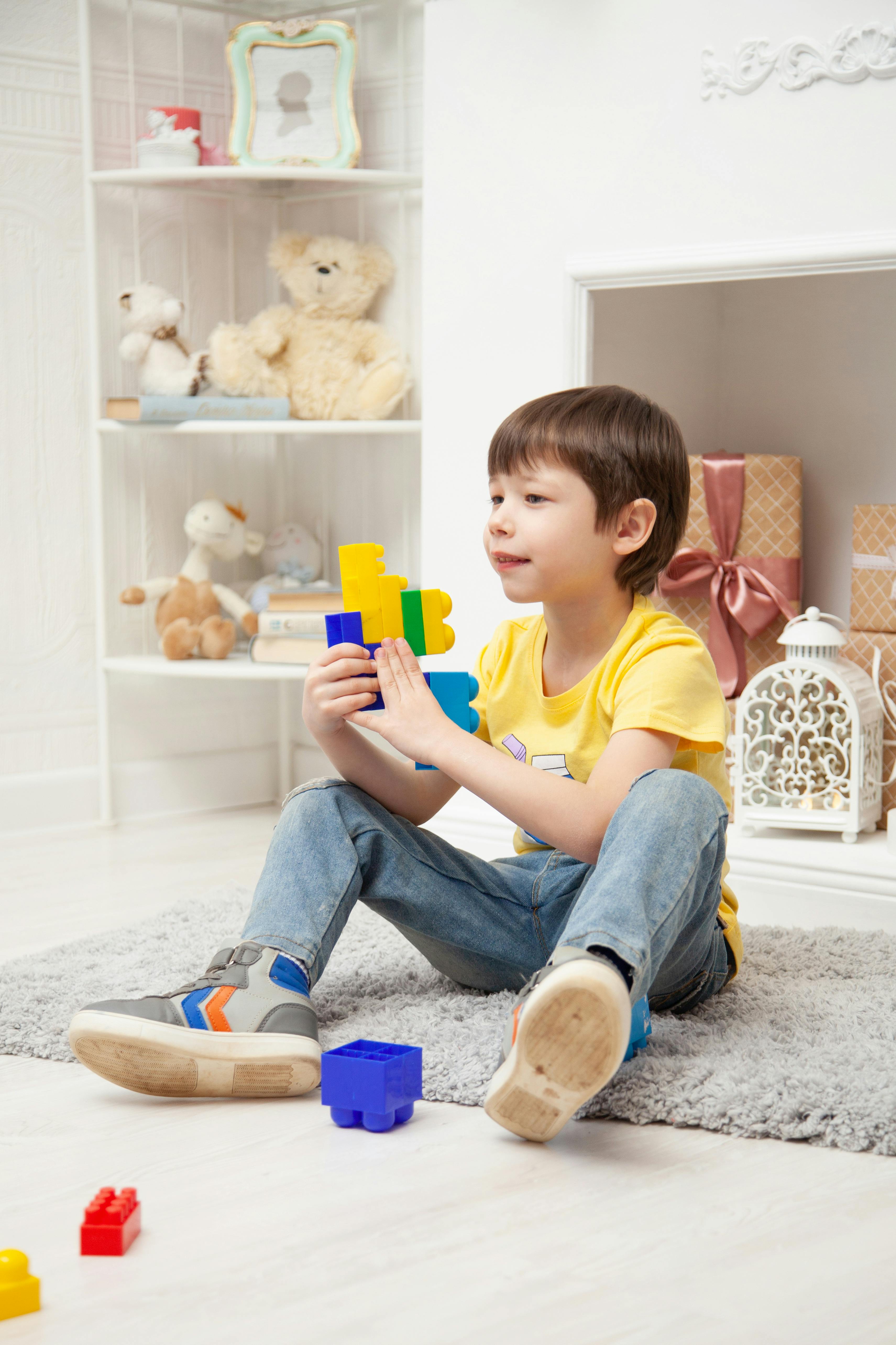 boy playing with toys