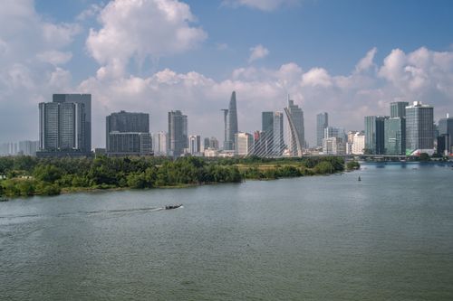 Free Captivating view of Ho Chi Minh City's skyline featuring modern architecture and Saigon River. Stock Photo
