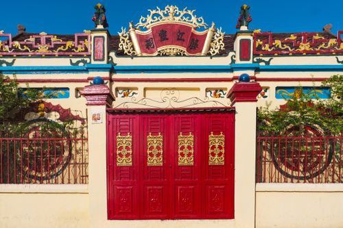 Free Colorful facade of a traditional Vietnamese temple in Ho Chi Minh City on a sunny day. Stock Photo