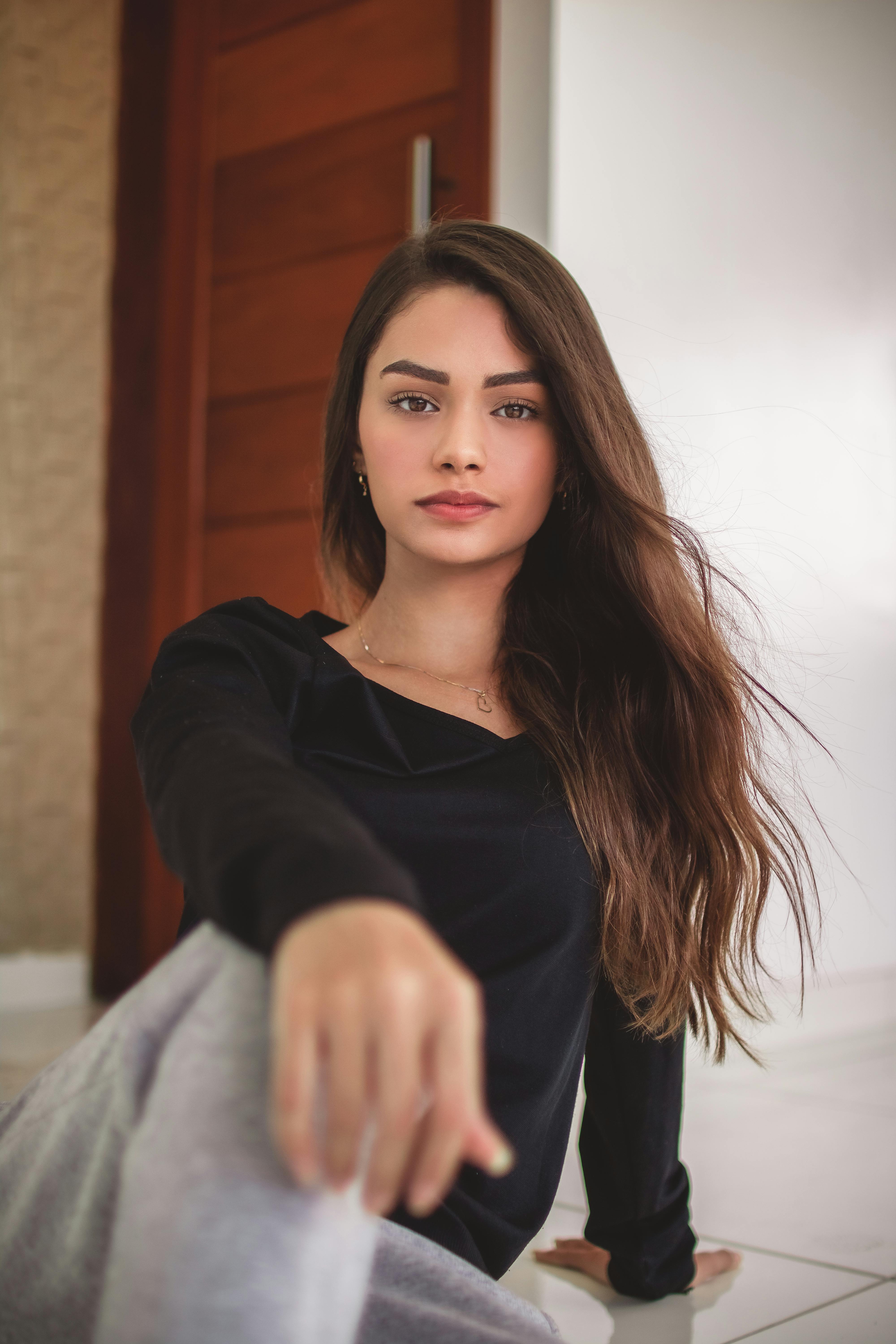 woman in black long sleeve shirt