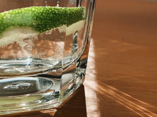 Clear Drinking Glass With Sliced Lime