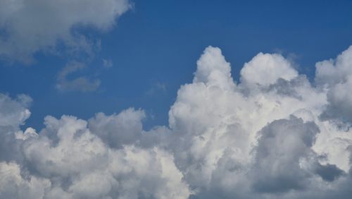 Free Dramatic cumulus clouds against a bright blue sky in Gia Lai, Vietnam. Stock Photo