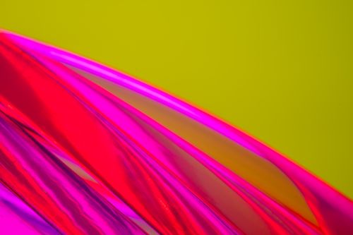 Free Dynamic and fluid abstract art with vibrant neon colors and glossy curves, perfect for modern design needs. Stock Photo