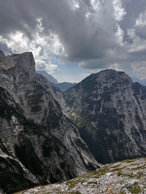 Free Dramatic landscape of the Julian Alps under a partly cloudy sky. Stock Photo