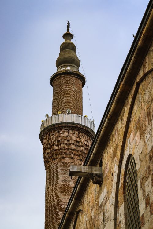 Free Elevated view of a historic minaret against a blue sky in Bursa, Türkiye. Stock Photo
