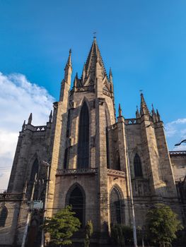 Stunning Gothic revival style church facade in Guadalajara, Mexico against a clear blue sky.