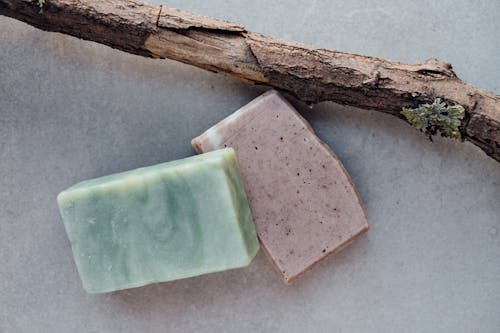 Green and Brown Soap on the Table