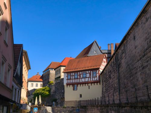 Free Explore traditional German architecture in a picturesque street scene under a clear blue sky. Stock Photo