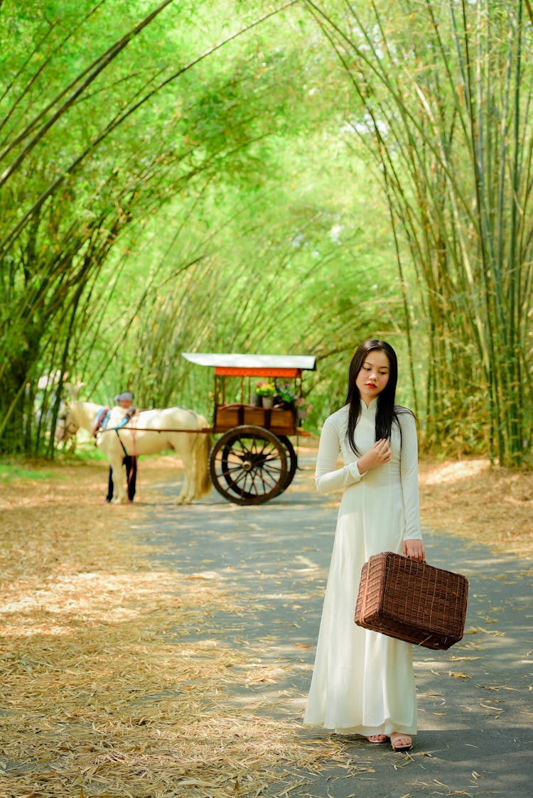 Sad Young Ethnic Lady Walking On Road In Park