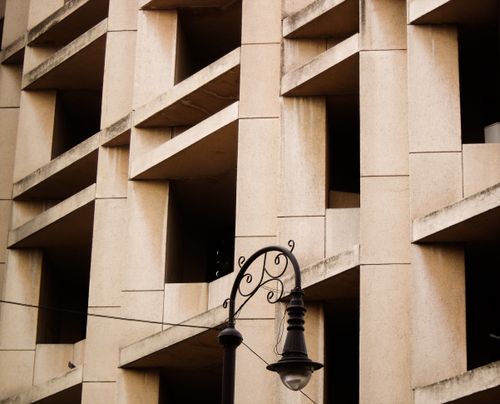 Free Angular architecture with vintage street lamp in Mexico City showcasing urban design contrast. Stock Photo