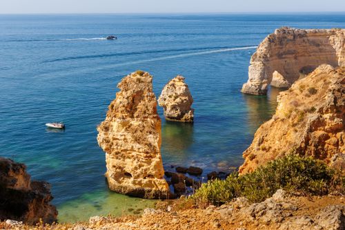 Free Explore the breathtaking rock formations along the Algarve coast in Portugal's Faro District. Stock Photo