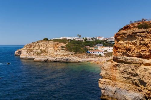 Free Explore the breathtaking cliffs and serene beach of Lagoa in Portugal. Stock Photo