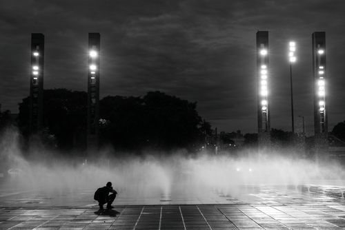 Free Moody black and white capture of Praça da Estação's illuminated towers and mist, Belo Horizonte. Stock Photo