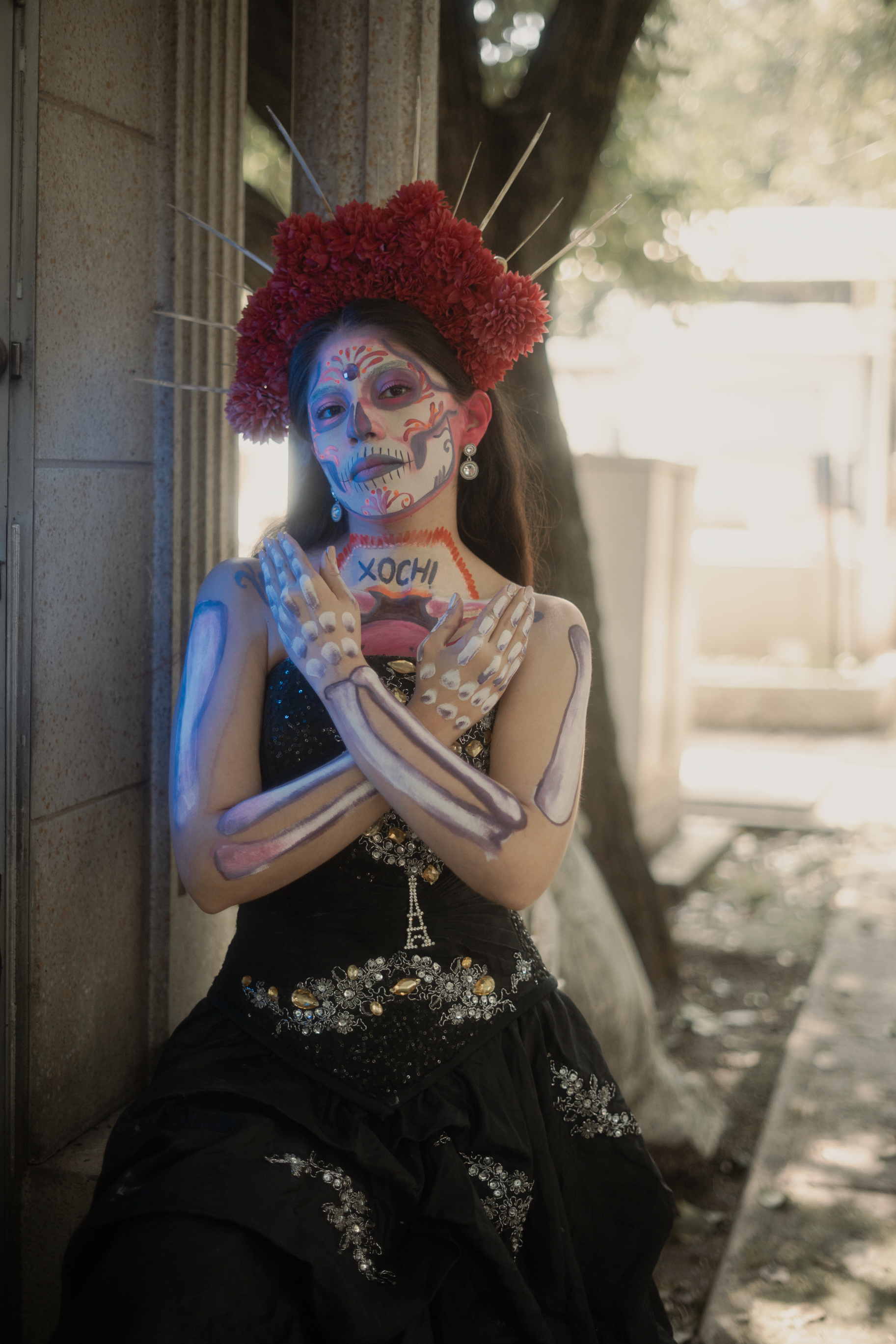 A stunning Catrina adorned with traditional makeup and flowers, honoring Dia de los Muertos in Mexico City.