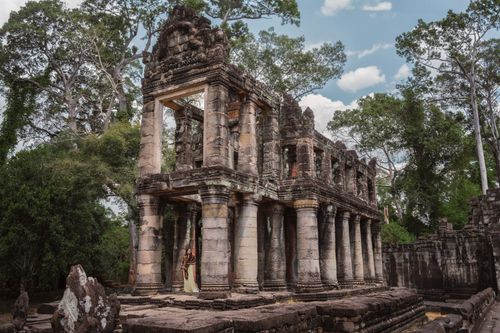 Free Explore the ancient temple ruins surrounded by lush tropical trees in Siem Reap, Cambodia. Stock Photo