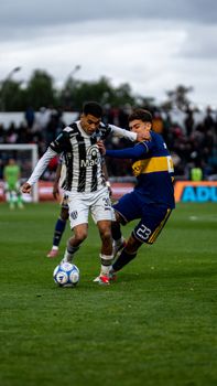 Exciting soccer match capturing players in action, showcasing skill and competition.